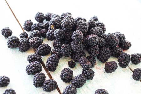 Photo for Sweet blackberries on a wooden background - Royalty Free Image