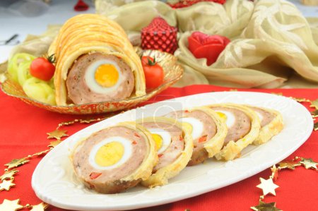 Photo for Rolled meat with eggs in puff dough - Royalty Free Image