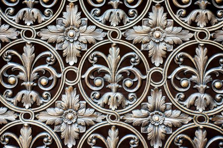 Photo for Brass security window ornamentation diminishing to soft focus - Royalty Free Image