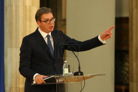 Photo for Belgrade, Serbia. September 12th 2017: Serbian President Aleksandar Vucic with national flag and flag European Union speaks at a press conference in the presidency, Belgrade 2017 - Royalty Free Image
