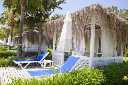 Photo for Luxury beach beds on resort - Royalty Free Image
