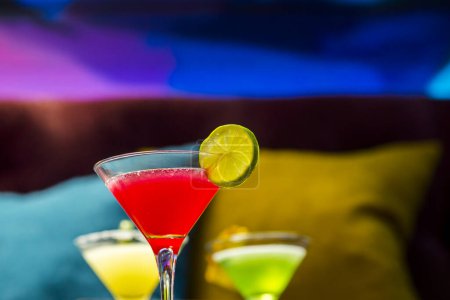 Photo for Colorful cocktail drinks in glasses on table - Royalty Free Image
