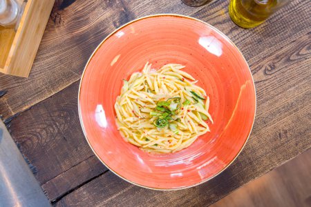Photo for Pasta with asparagus and zucchini on plate - Royalty Free Image