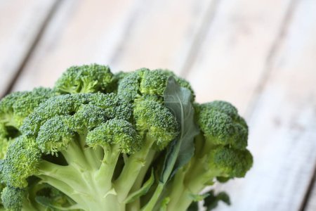 Photo for Broccoli on a wooden background - Royalty Free Image
