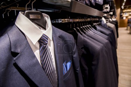 Photo for Male casual suit in wardrobe - Royalty Free Image
