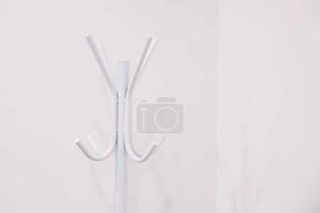 Photo for White coat rack on white background - Royalty Free Image