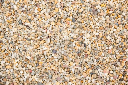 Téléchargez les photos : Petites pierres texture fond sur la plage - en image libre de droit