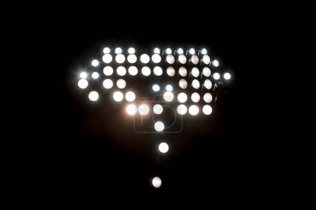 Photo for Stadium lights reflectors against black background - Royalty Free Image