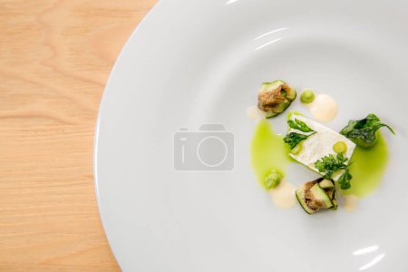 Photo for Tasty dish with cheese, eggplant, parsley and olive oil - Royalty Free Image