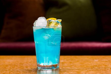 Photo for Blue cocktail with ice and lemon - Royalty Free Image