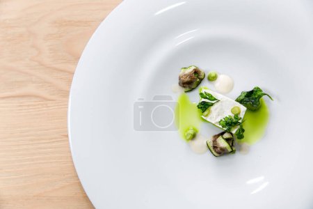 Photo for Tasty dish with cheese, eggplant, parsley and olive oil - Royalty Free Image