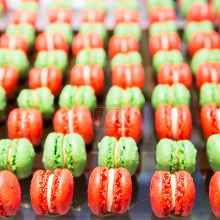 Photo for Red and green macaroons in rows - Royalty Free Image