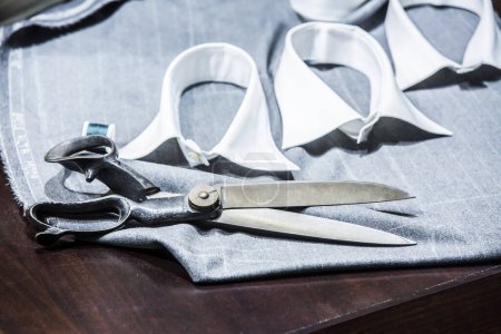 Photo for Old tailor shears and shirts - Royalty Free Image