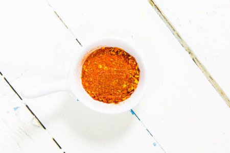 Photo for Chili sauce on wooden table - Royalty Free Image