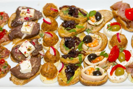 Photo for Top view of small canapes set - Royalty Free Image