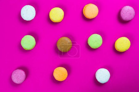 Photo for Sweet macaroons on pink background - Royalty Free Image