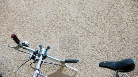 Photo for Partial bicycle near wall - Royalty Free Image