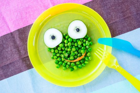 Photo for Healthy and fun food for kids, smiley frog - Royalty Free Image