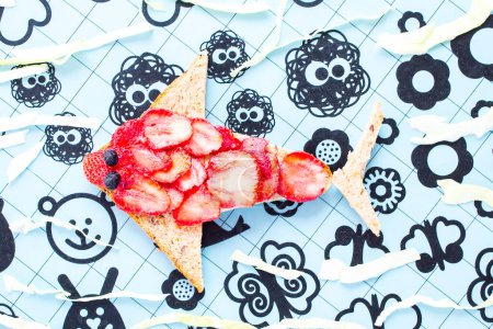 Photo for Healthy and fun food for kids, strawberry fish - Royalty Free Image