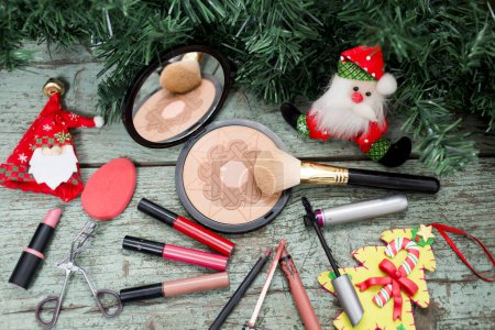Photo for Various makeup products with Christmas decoration - Royalty Free Image