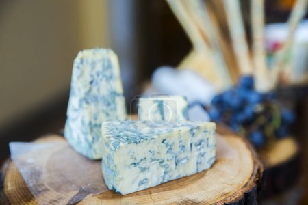 Photo for Blue cheese on wooden table - Royalty Free Image