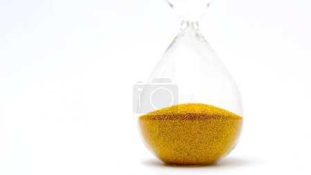 Photo for Hourglass with gold beads on white background - Royalty Free Image