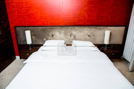 Photo for Interior of a modern red and brown bedroom - Royalty Free Image