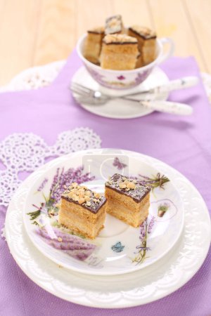 Photo for Small cakes with chocolate, walnuts and biscuits - Royalty Free Image