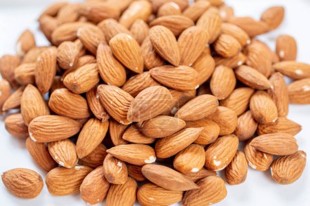 Photo for Bunch of unroasted Almond nuts - Royalty Free Image