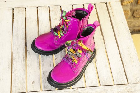 Photo for Children's pink patent leather boots - Royalty Free Image