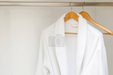Photo for Close up of bathrobe in wardrobe background - Royalty Free Image