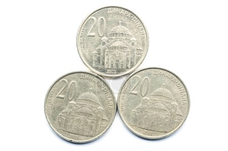 Foto de Tres monedas sobre fondo blanco - Imagen libre de derechos