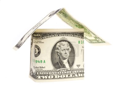 Téléchargez les photos : Dollar maison isolée sur fond blanc - en image libre de droit