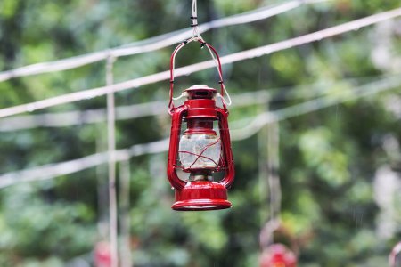Photo for Vintage kerosene oil lantern lamps hanging on the wire - Royalty Free Image