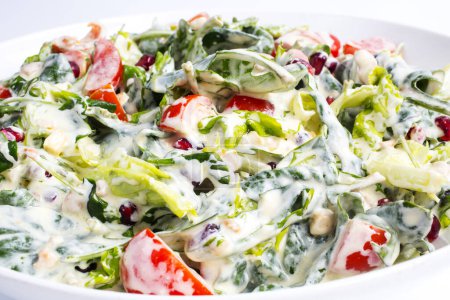 Photo for Salad with vegetables and sauce with cream - Royalty Free Image