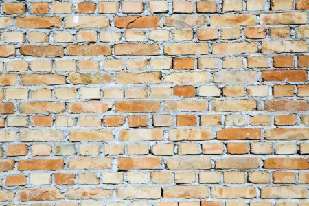 Téléchargez les photos : Vieux mur de briques dans une image de fond - en image libre de droit