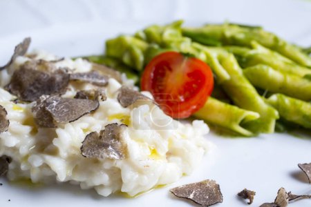 Photo for Risotto with truffles and pasta with asparagus - Royalty Free Image