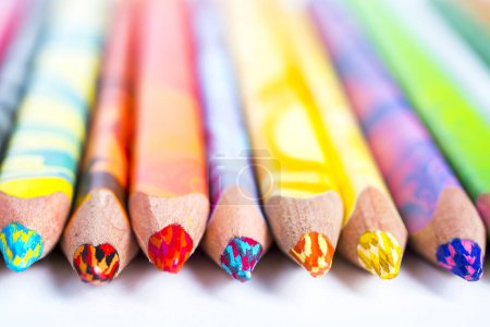 Photo for Colorful pencil crayons on a white background - Royalty Free Image