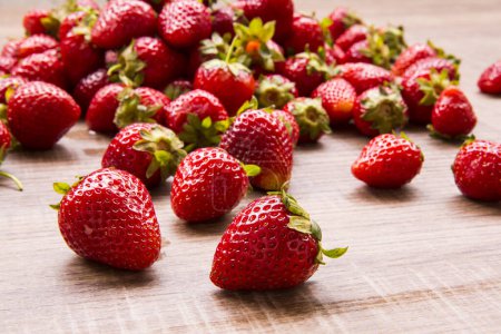 Photo for Strawberries on garden's table - Royalty Free Image