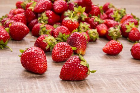 Photo for Strawberries on garden's table - Royalty Free Image