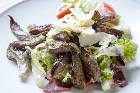 Photo for Salad steak on white plate - Royalty Free Image