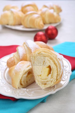 Photo for Croissants with sugar and vanilla cream - Royalty Free Image