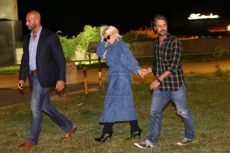 Photo for BELGRADE - JUNE: Lady Gaga and Taylor Kinney in melancholic Beorad after dinner at a restaurant on July 4, 2015 in Belgrade,Serbia - Royalty Free Image