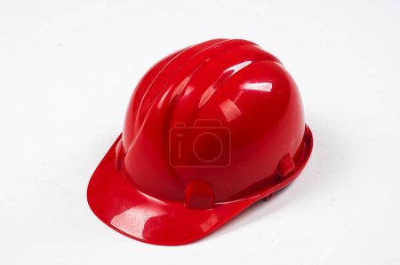 Foto de Casco de construcción rojo tiro aislado en blanco - Imagen libre de derechos