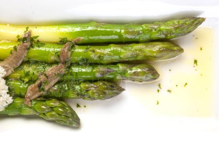 Photo for Bunch of asparagus with anchovies, olives - Royalty Free Image