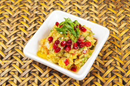 Photo for Oriental Arabic food hummus with pomegranate seeds. - Royalty Free Image