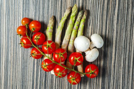 Photo for Fresh organic vegetables on wooden background - Royalty Free Image