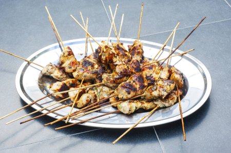 Photo for Grilled chicken on bamboo skewers - Royalty Free Image