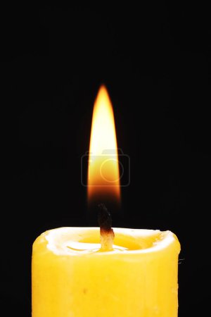 Photo for Candle flame on dark background - Royalty Free Image
