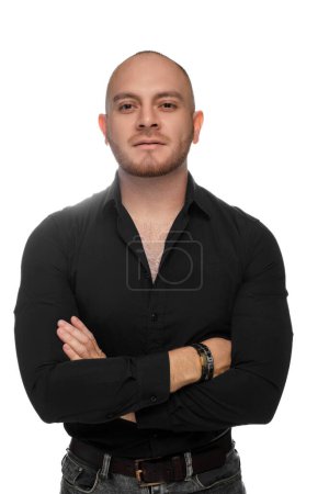 Photo for Backlight portrait of man with arms crossed with positive attitude - Royalty Free Image